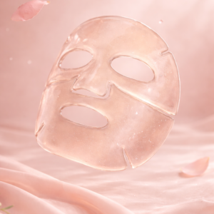 Translucent hydrogel LED face mask floating against a soft blush pink background, showcasing a lightweight, skin-hugging design for advanced light therapy skincare.